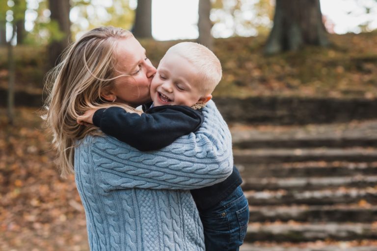 mom kissing son, family, lifestyle, park, Bemus Point, Photographer, NP Photography